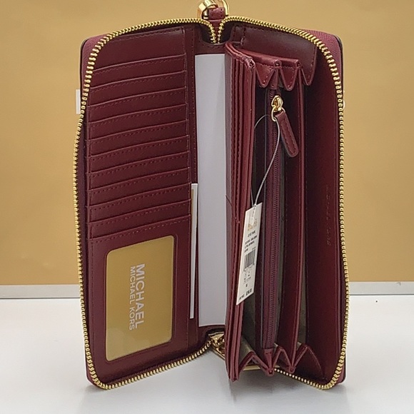 MICHAEL KORS
Leather Continental Wristlet Phone Case Wallet
Oxblood
NWT - Picture 6 of 16